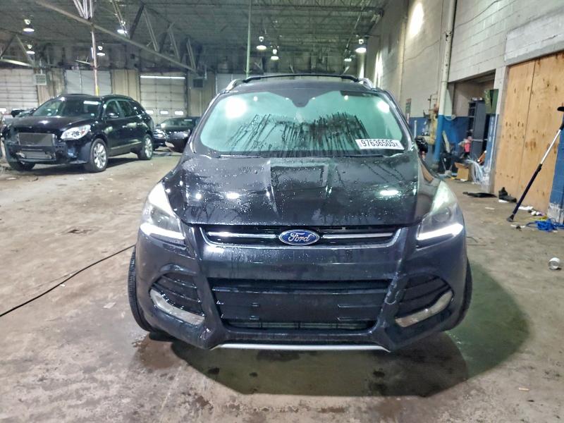 Foto 5 de la subasta – 2015 FORD ESCAPE TIT con VIN 1FMCU9J98FUC22835