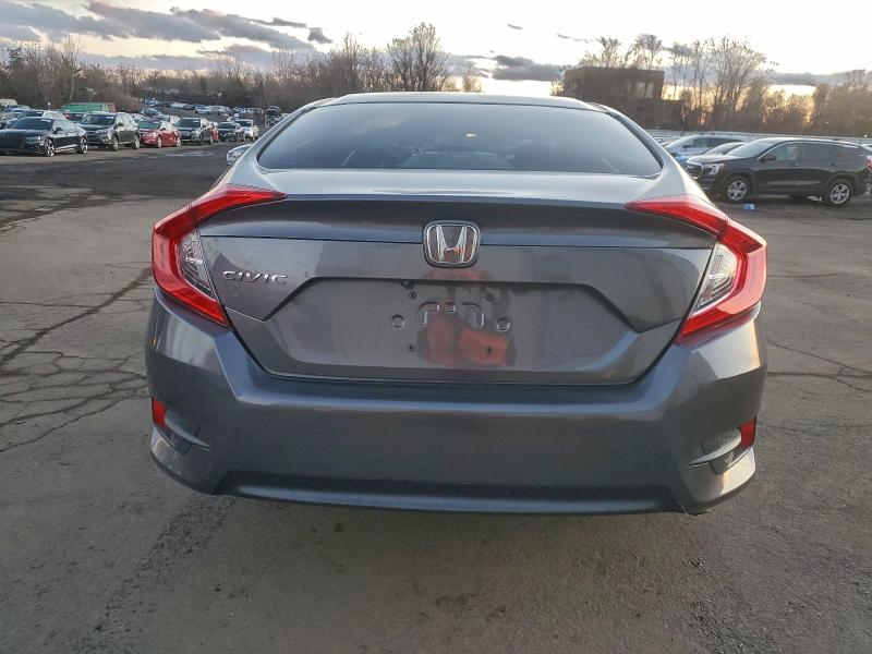 Photo 6 from auction – 2017 HONDA CIVIC LX with VIN 19XFC2F58HE203351