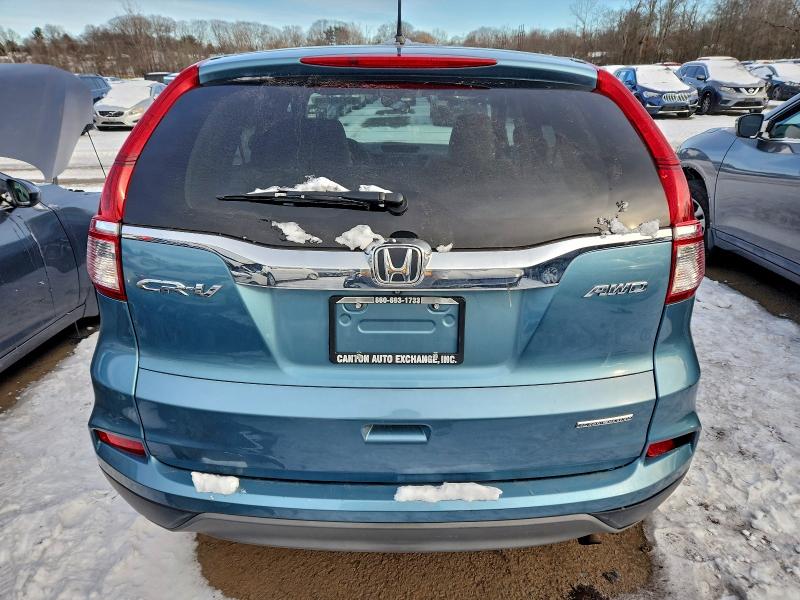 Photo 6 from auction – 2016 HONDA CR-V SE with VIN 5J6RM4H41GL102887