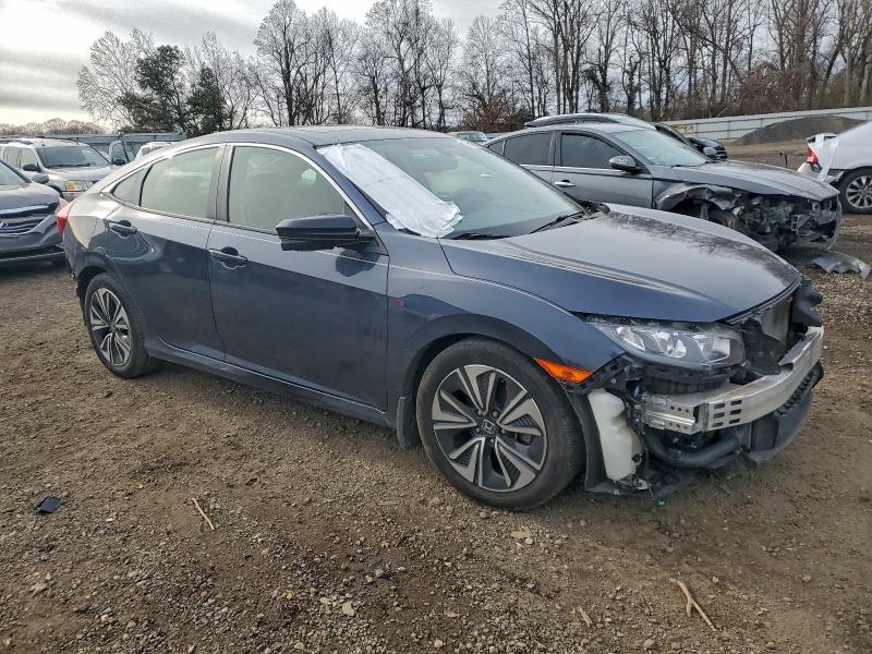 Photo 4 from auction – 2018 HONDA CIVIC EXL with VIN JHMFC1F74JX009447