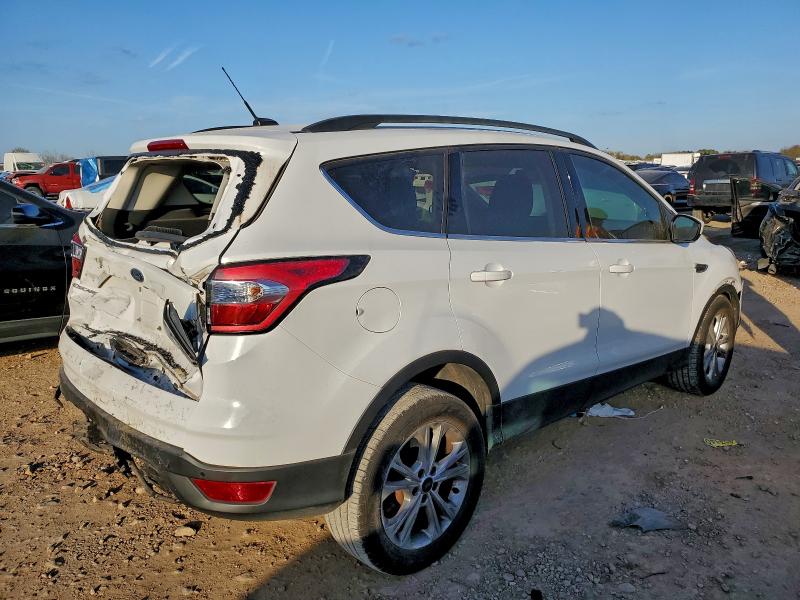 Photo 3 from auction – 2017 FORD ESCAPE SE with VIN 1FMCU0G98HUD93106