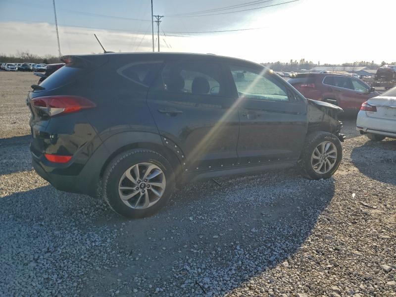 Photo 3 from auction – 2016 HYUNDAI TUCSON SE with VIN KM8J23A47GU237147