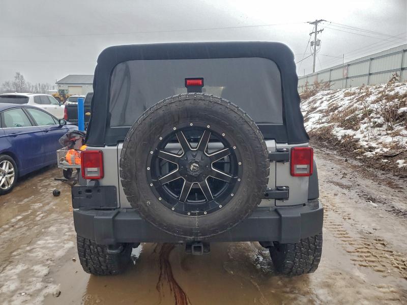 Photo 6 from auction – 2015 JEEP WRANGLER U with VIN 1C4BJWDG8FL690703