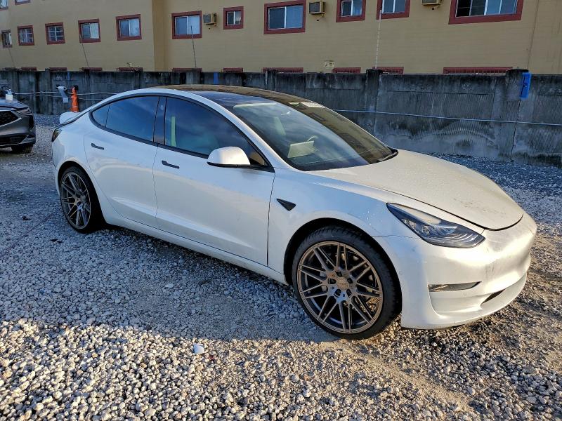 Photo 4 from auction – 2022 TESLA MODEL 3 with VIN 5YJ3E1EB2NF260455