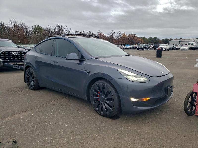 Photo 4 from auction – 2022 TESLA MODEL Y with VIN 7SAYGDEF8NF543160