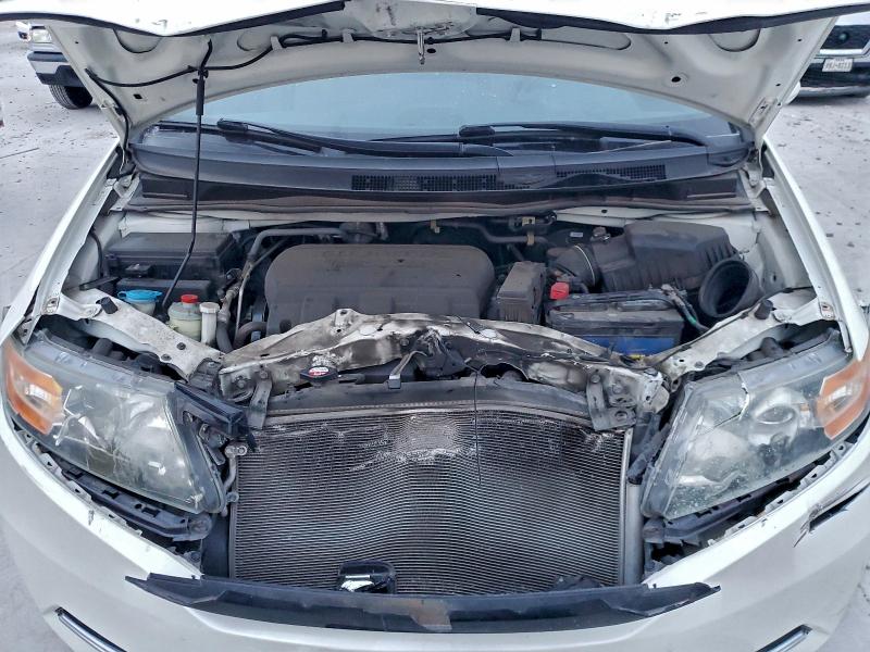 Photo 12 from auction – 2016 HONDA ODYSSEY with VIN 5FNRL5H46GB046074