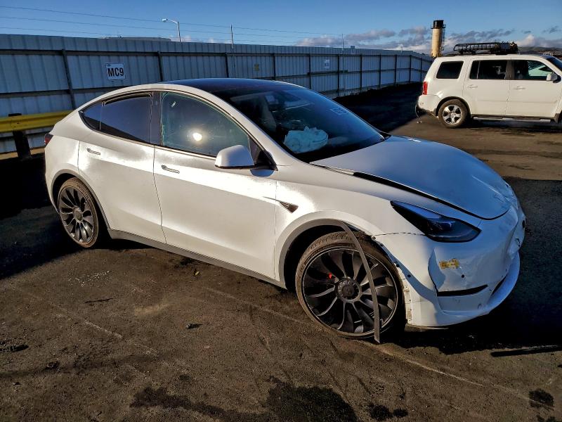 Photo 4 from auction – 2022 TESLA MODEL Y with VIN 7SAYGDEF6NF491656