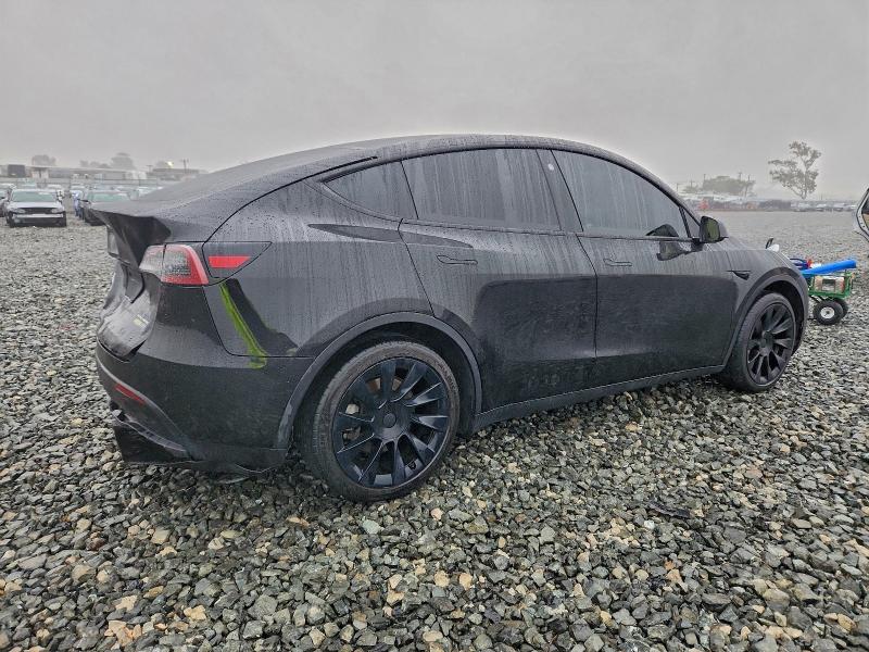 Photo 3 from auction – 2023 TESLA MODEL Y with VIN 7SAYGAEE4PF632166