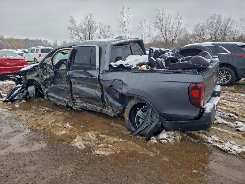 Photo 2 from auction – 2023 HONDA RIDGELINE with VIN 5FPYK3F51PB060681