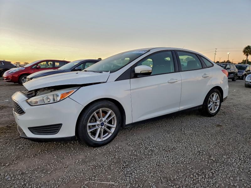 FORD FOCUS 2017 with VIN 1FADP3F25HL218846 - Photo from auction