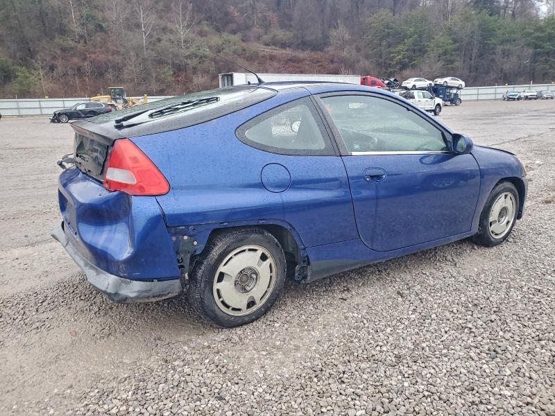Photo 3 from auction – 2001 HONDA INSIGHT with VIN JHMZE13501T000469