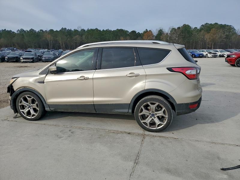 Photo 2 from auction – 2017 FORD ESCAPE TIT with VIN 1FMCU0J9XHUD34180