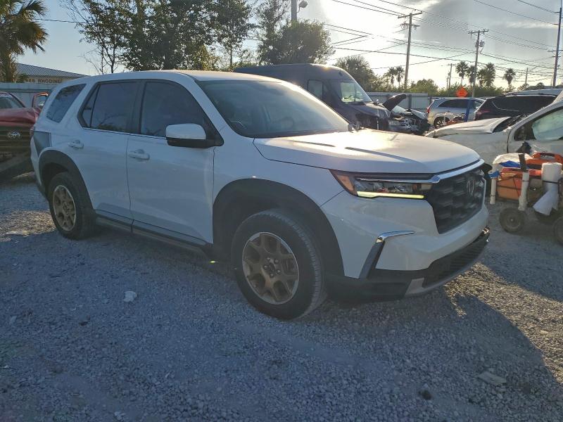 Photo 4 from auction – 2023 HONDA PILOT EXL with VIN 5FNYG2H52PB011233