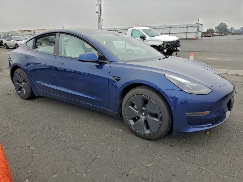 Photo 4 from auction – 2022 TESLA MODEL 3 with VIN 5YJ3E1EB8NF137498