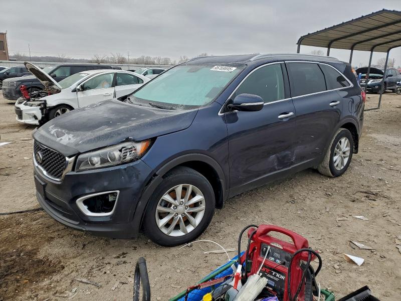 KIA SORENTO 2016 with VIN 5XYPG4A32GG029806 - Photo from auction