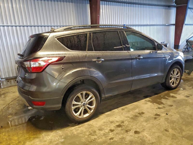 Photo 3 from auction – 2018 FORD ESCAPE with VIN 1FMCU9HD4JUD61721