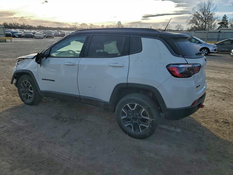 Photo 2 from auction – 2021 JEEP COMPASS TR with VIN 3C4NJDDB6MT572267