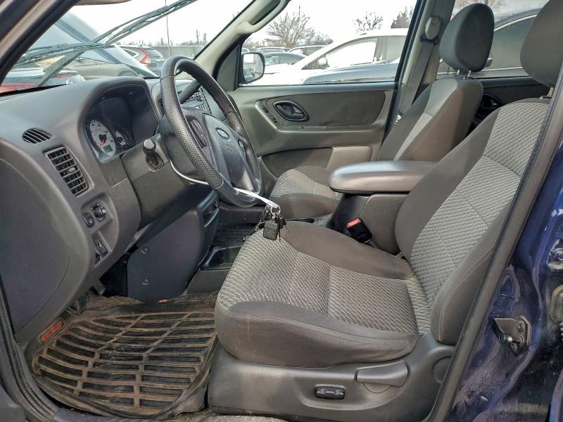 Photo 7 from auction – 2003 FORD ESCAPE XLT with VIN 1FMYU03153KE08946