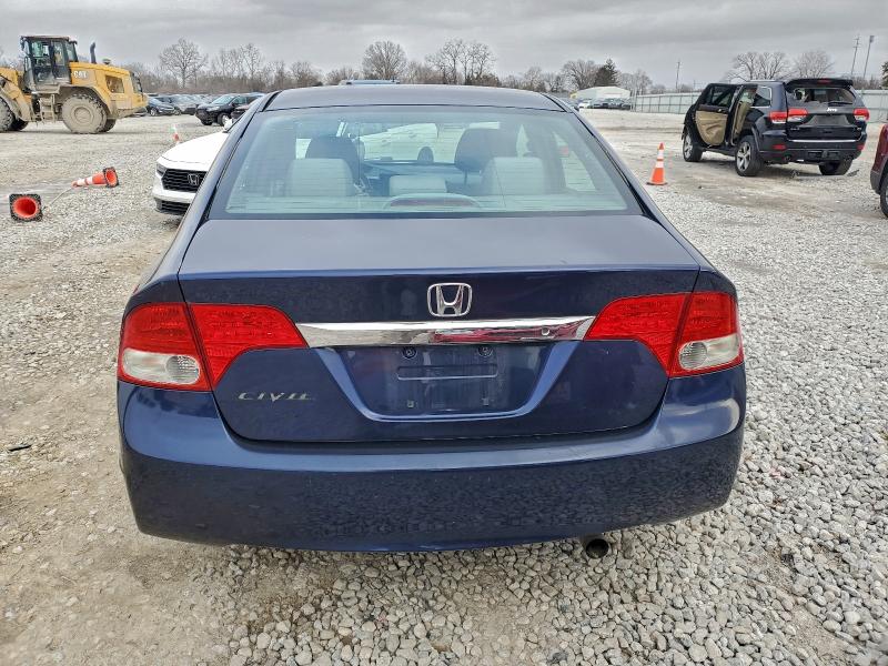 Photo 6 from auction – 2009 HONDA CIVIC LX with VIN 19XFA165X9E045158
