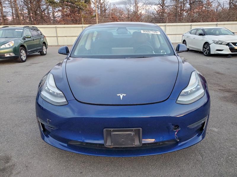 Photo 5 from auction – 2022 TESLA MODEL 3 with VIN 5YJ3E1EB5NF259607