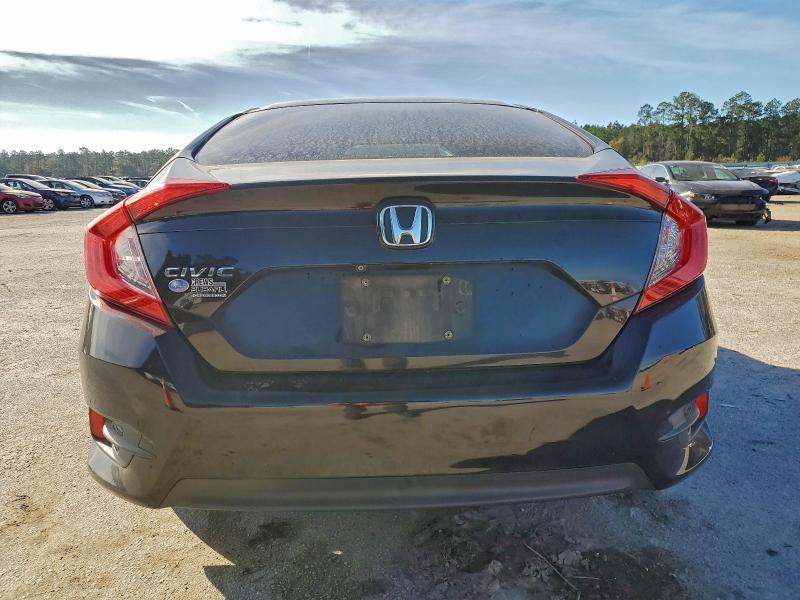 Photo 6 from auction – 2016 HONDA CIVIC LX with VIN 19XFC2F54GE009110