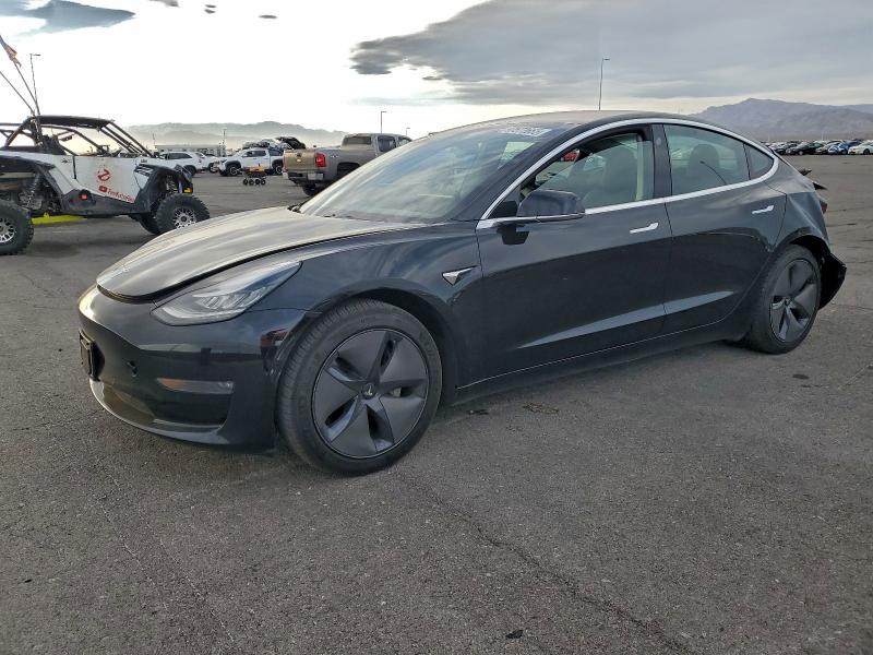 TESLA MODEL 3 2018 with VIN 5YJ3E1EA9JF057838 - Photo from auction