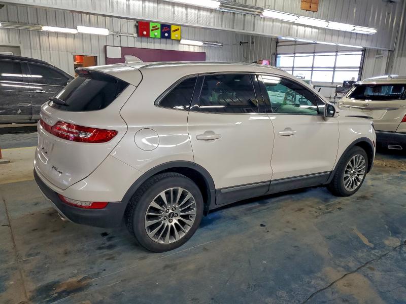 Photo 3 from auction – 2018 LINCOLN MKC RESERV with VIN 5LMCJ3D97JUL03073