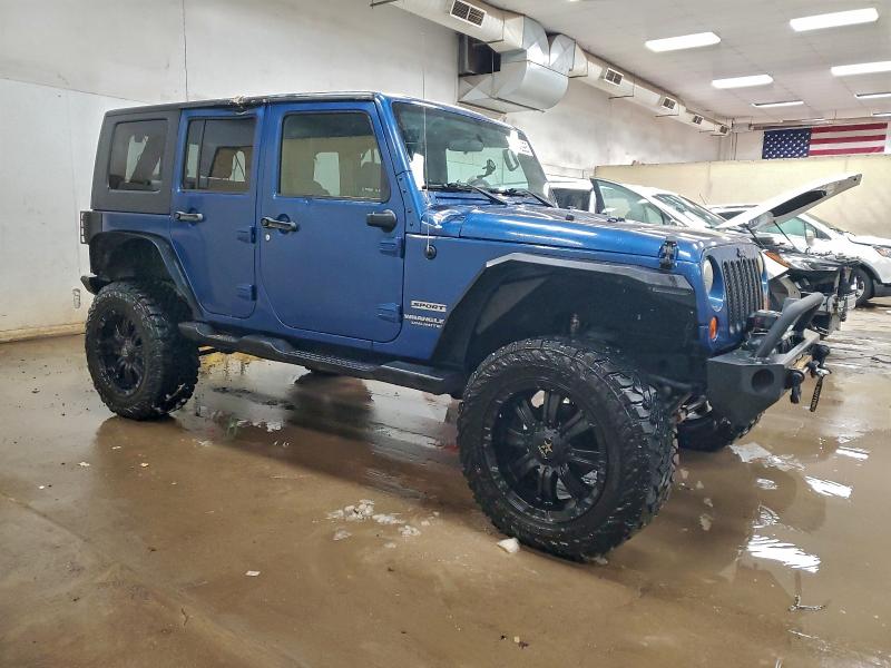 Photo 4 from auction – 2010 JEEP WRANGLER U with VIN 1J4BA3H19AL107241