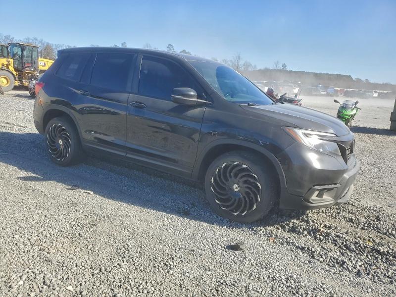 Photo 4 from auction – 2021 HONDA PASSPORT E with VIN 5FNYF8H58MB011142