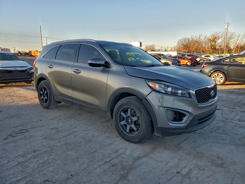 Photo 4 from auction – 2016 KIA SORENTO LX with VIN 5XYPG4A32GG028008