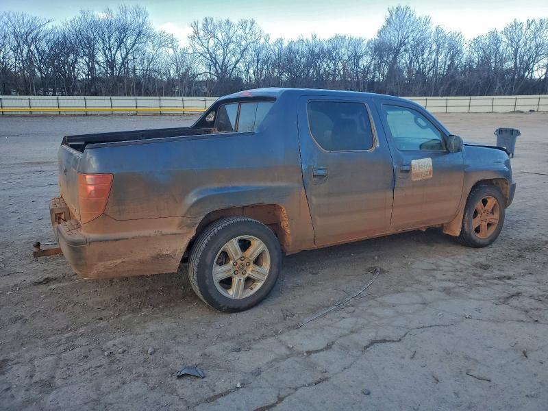 Photo 3 from auction – 2011 HONDA RIDGELINE with VIN 5FPYK1F51BB006696