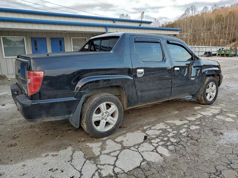 Photo 3 from auction – 2011 HONDA RIDGELINE with VIN 5FPYK1F56BB006600