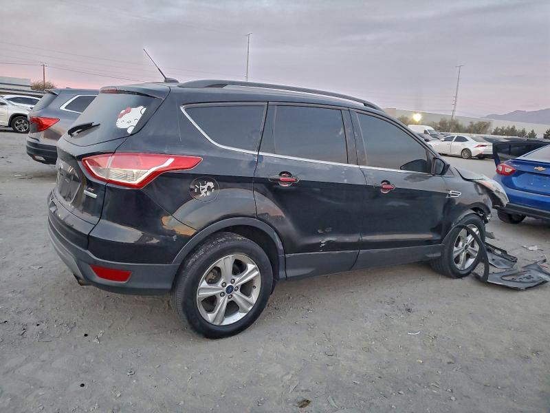 Photo 3 from auction – 2016 FORD ESCAPE with VIN 1FMCU0G91GUB34097
