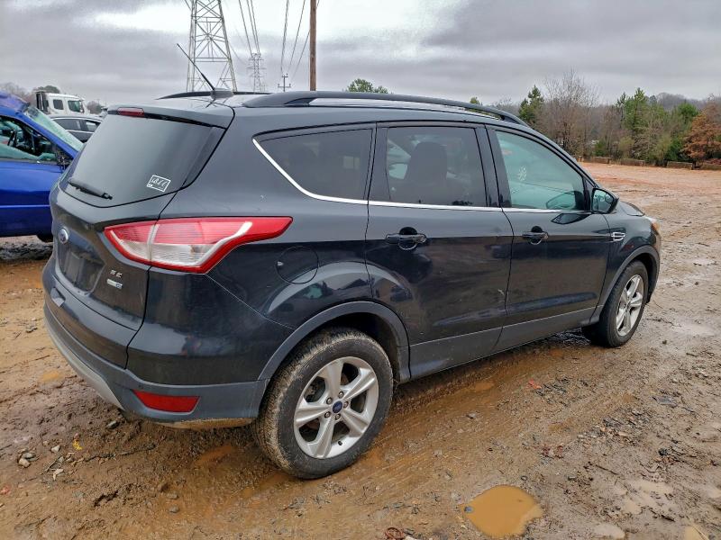 Photo 3 from auction – 2015 FORD ESCAPE SE with VIN 1FMCU9G97FUC67143