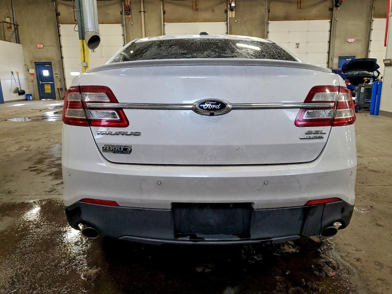 Photo 6 from auction – 2014 FORD TAURUS SEL with VIN 1FAHP2E82EG117608