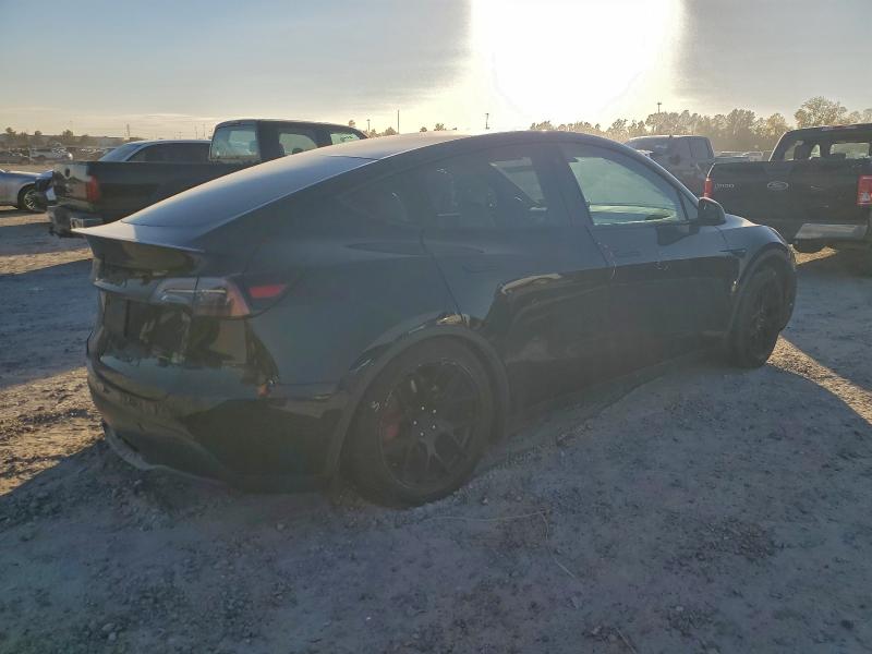 Photo 3 from auction – 2022 TESLA MODEL Y with VIN 7SAYGDEF0NF340554