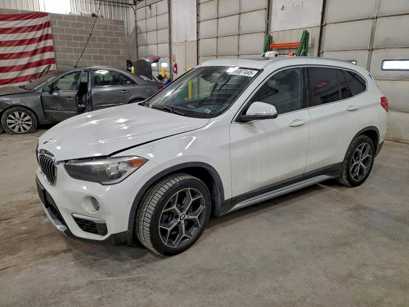 BMW X1 XDRIVE2 2018 with VIN WBXHT3C3XJ5L28700 - Photo from auction