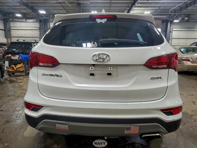 Photo 6 from auction – 2018 HYUNDAI SANTA FE S with VIN 5NMZU3LB6JH101670