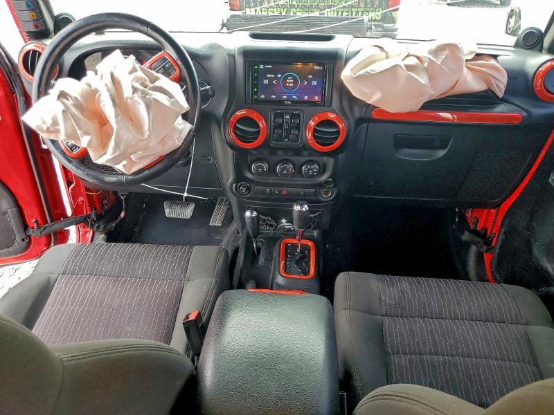 Photo 8 from auction – 2011 JEEP WRANGLER U with VIN 1J4BA5H18BL603600