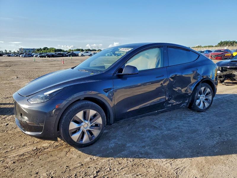 TESLA MODEL Y 2024 with VIN 7SAYGDED5RF091883 - Photo from auction