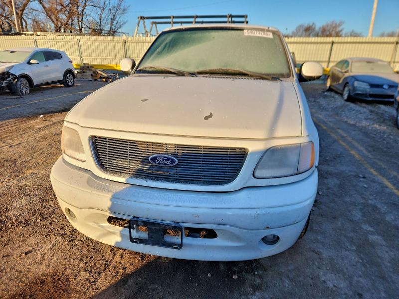 Photo 5 from auction – 2003 FORD F150 with VIN 2FTRX17WX3CA42241