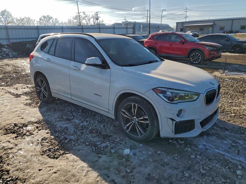 Photo 4 from auction – 2016 BMW X1 XDRIVE2 with VIN WBXHT3C33G5E50911