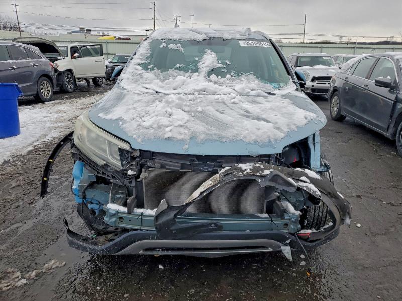 Photo 5 from auction – 2016 HONDA CR-V EXL with VIN 2HKRM3H77GH538996