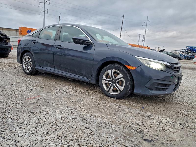 Photo 4 from auction – 2018 HONDA CIVIC LX with VIN 19XFC2F53JE007470