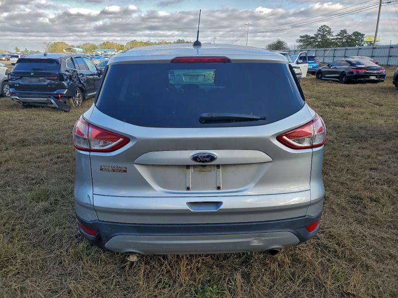 Photo 6 from auction – 2016 FORD ESCAPE SE with VIN 1FMCU0G77GUB58645
