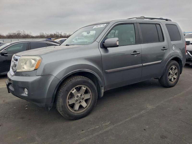 HONDA PILOT TOUR 2009 with VIN 5FNYF48979B048427 - Photo from auction