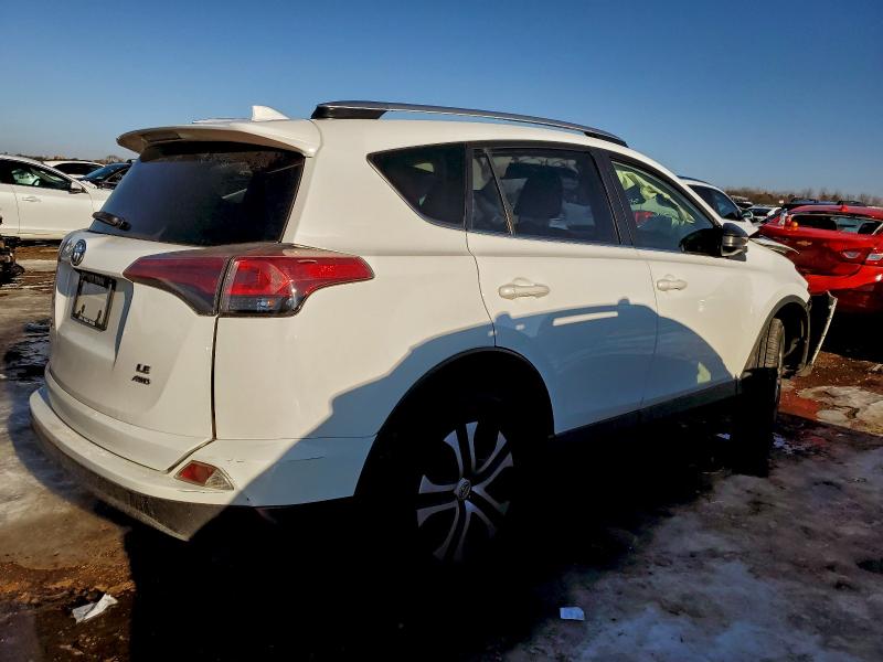 Photo 3 from auction – 2016 TOYOTA RAV4 LE with VIN JTMBFREV9GJ093380