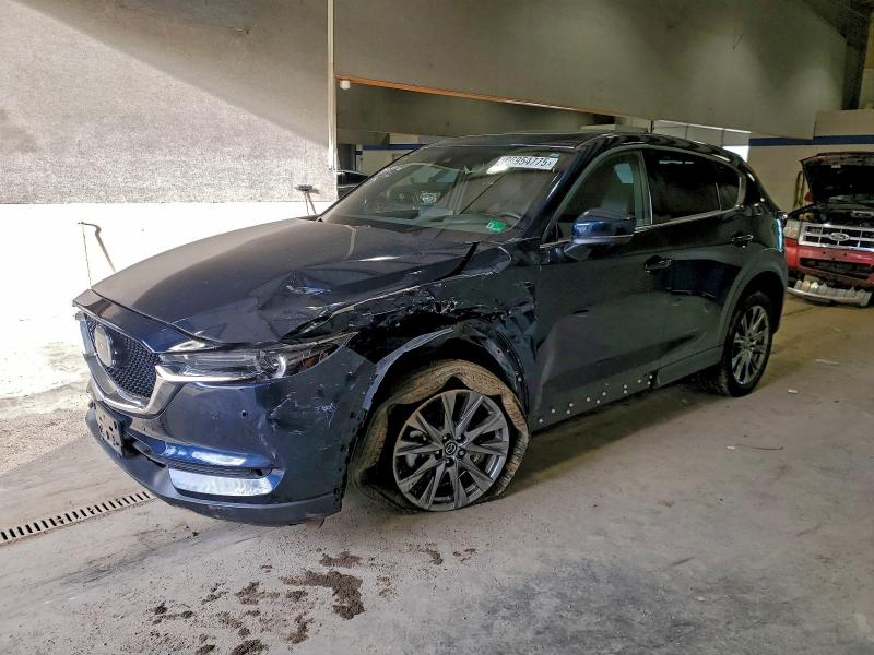 MAZDA CX-5 SIGNA 2021 with VIN JM3KFBEY8M0438523 - Photo from auction