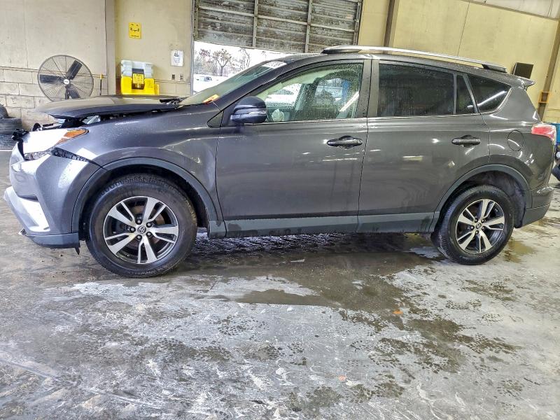 TOYOTA RAV4 XLE 2017 with VIN JTMRFREV3HJ705587 - Photo from auction