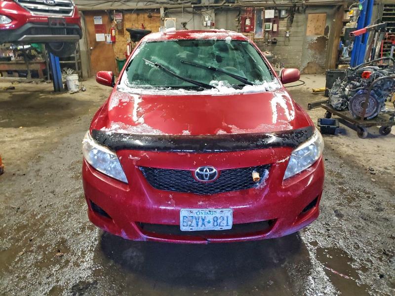 Photo 5 from auction – 2010 TOYOTA COROLLA with VIN 2T1BU4EE7AC222065